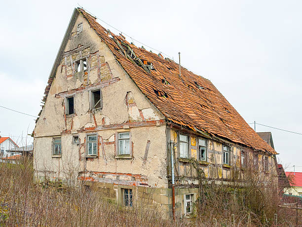 istock rundown old farmhouse 529658674
