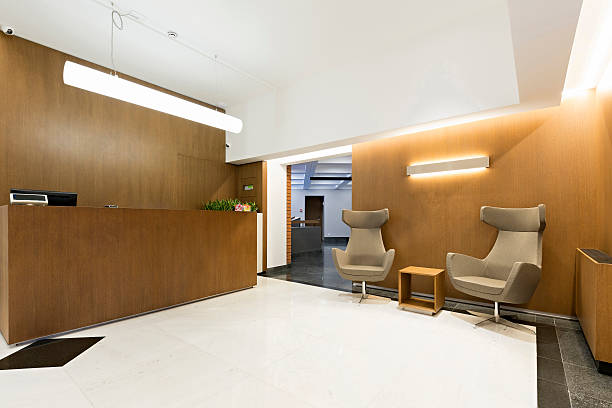 istock Reception area with wooden reception desk 529660032