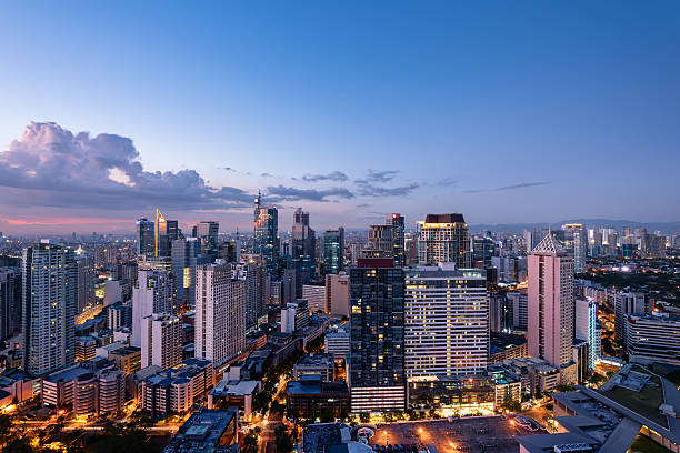Makati skyline (Manila - Philippines) Eleveted, night view of Makati, the business district of Metro Manila. philippines photos stock pictures, royalty-free photos & images