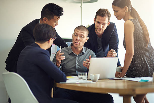 istock Teamwork allows employees to take greater responsibility for decision making 529663056
