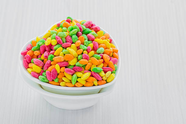 istock Colorful Rice Cereal on the pink dishcloth 529664212