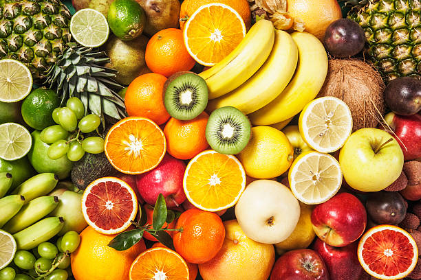 Fruit background Fresh fruit background. Healthy eating and dieting concept. Winter assortment. Top view tropical fruit stock pictures, royalty-free photos & images