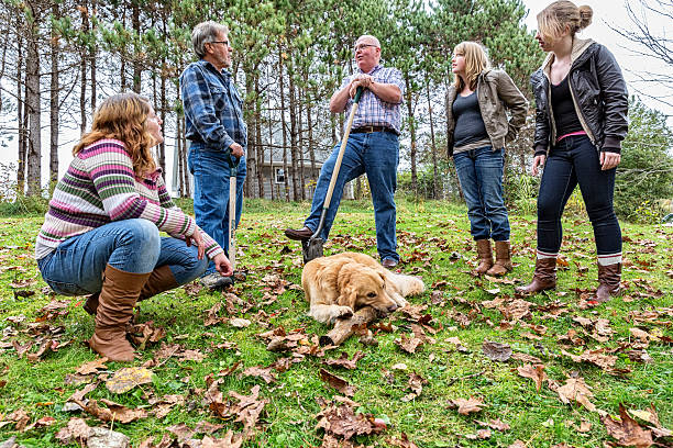 istock Neighbor Stops to Tell a Story While Working Outdoors 529665526
