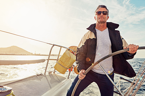 Shot of a man out on a boat trip alone