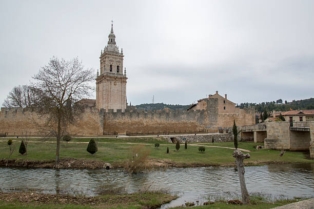 istock River and bell tower in El Burgo de Osma 529668212