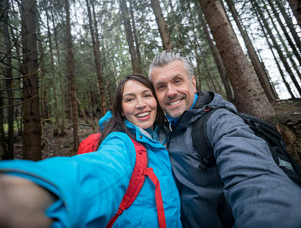 istock Trekking couple taking a selfie 529668246