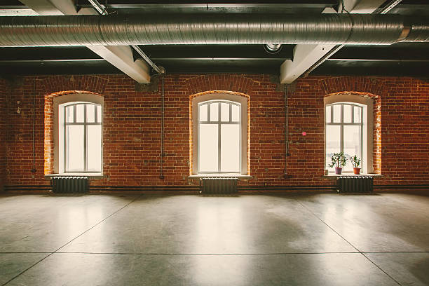 istock Loft studio Interior in old house. Big windows 529670094