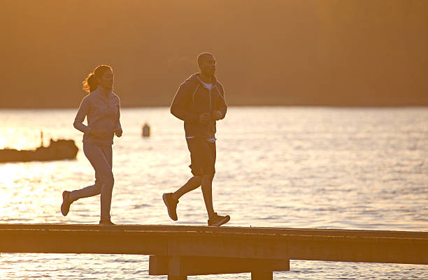 istock Multi ethnic couple running during a morning workout 529673704
