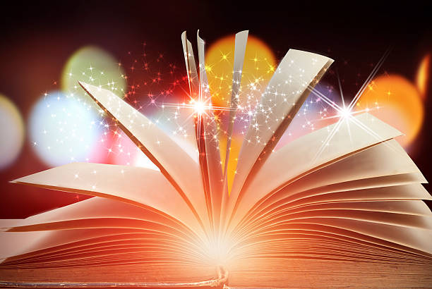 istock Abstract magic book on wooden background 529675914