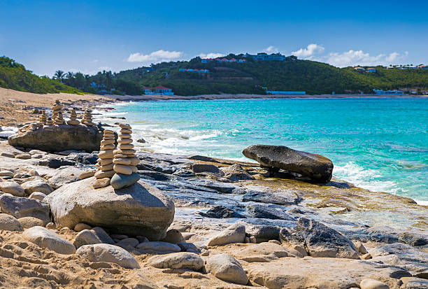 istock Stacks of stones in balance at a beach 529676348