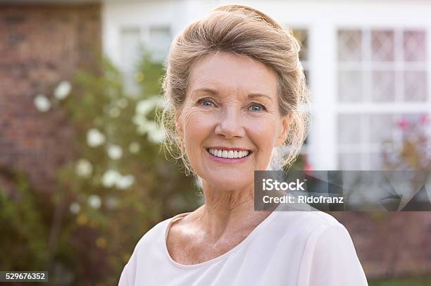 Smiling Senior Woman Stock Photo - Download Image Now - Senior Women, Smiling, Dentures