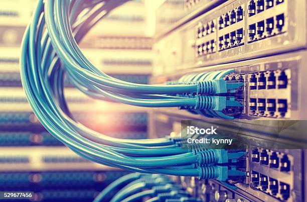 Network Cable With High Tech Technology Color Background Stock Photo - Download Image Now