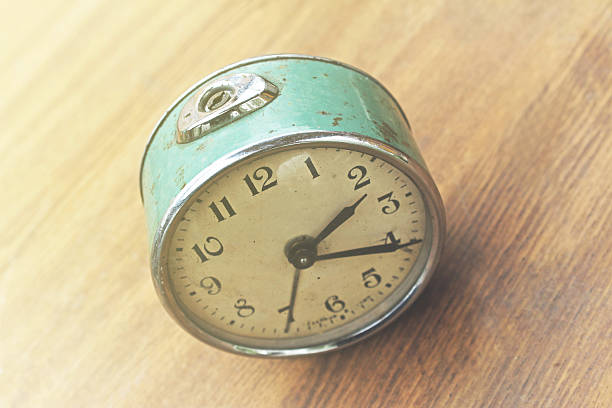 istock Desktop home watch on a wooden background 529679080