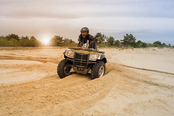 istock Racing ATV in the sand. 529681412