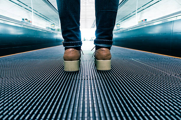 istock Traveler walking in airport 529681870