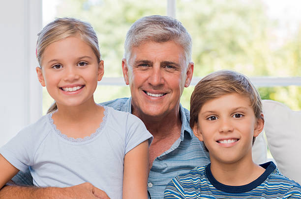 istock Happy grandfather and grandchildren 529682000