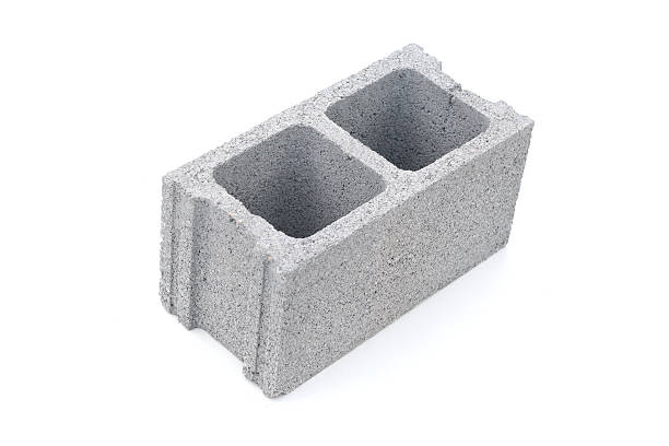 gris cemento bloque de la construcción aislado sobre blanco - bloque de cemento fotografías e imágenes de stock