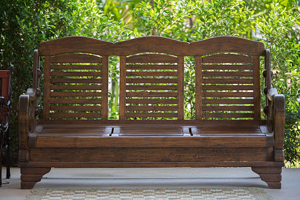 istock wooden bench in garden 529683294