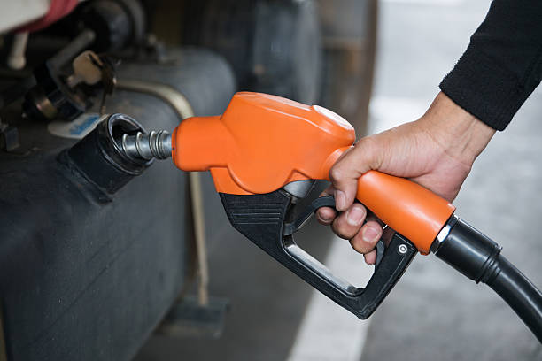 istock Handle fuel nozzle to refuel the car. 529683618