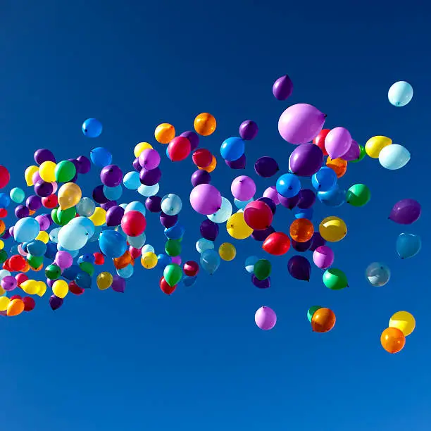 Photo of Colorful Balloons flying in the sky party