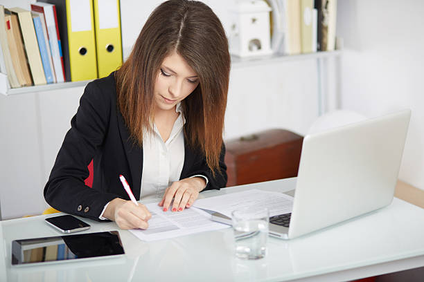istock businesswoman working in office 529684190