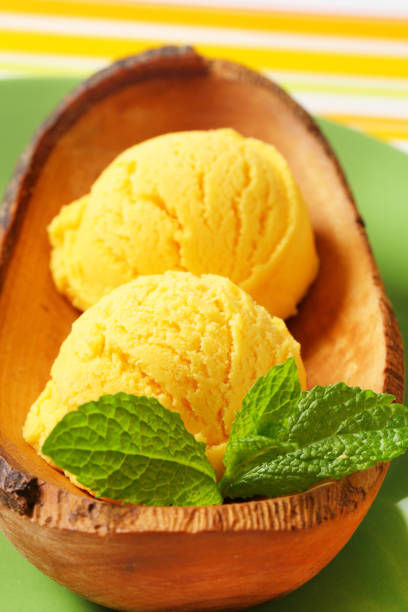 istock Ice cream served in natural wood bowl 529689123