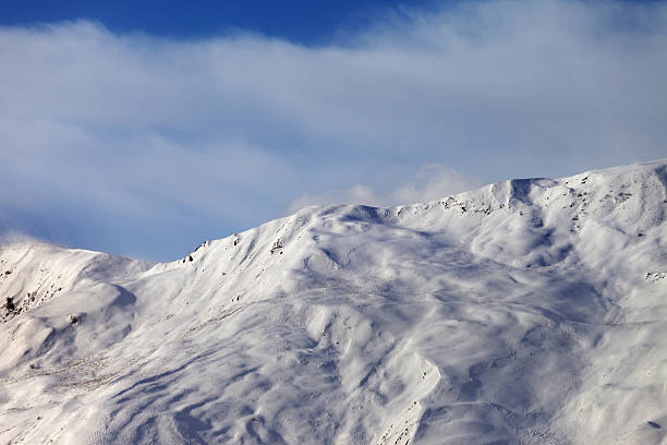 istock View on off-piste slope in wind morning 529692473