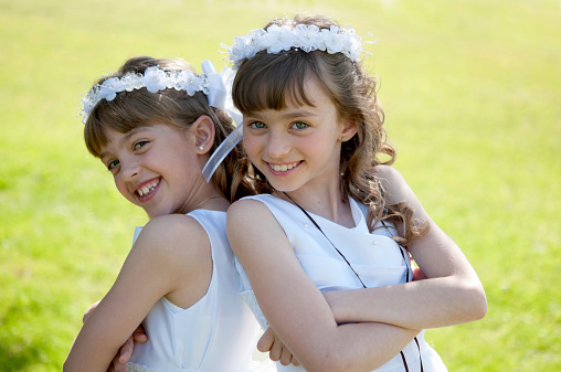 Young girls doing her catholic first holy communion