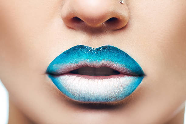 istock Macro photo of womans lips with lipstick 529695661