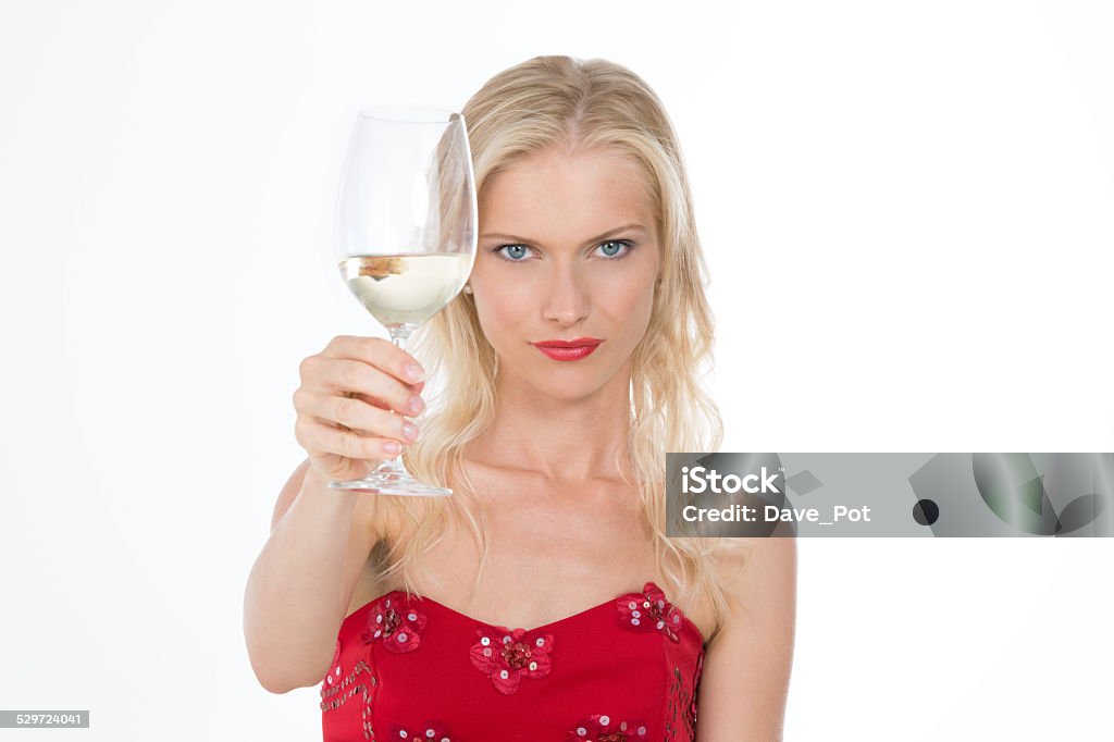 nordic girl having a toast with a glass of wine composed blond female celebrating something with a glasswine 25-29 Years Stock Photo