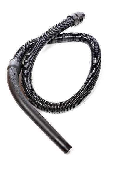 istock Black hose of the vacuum cleaner isolated 529724421