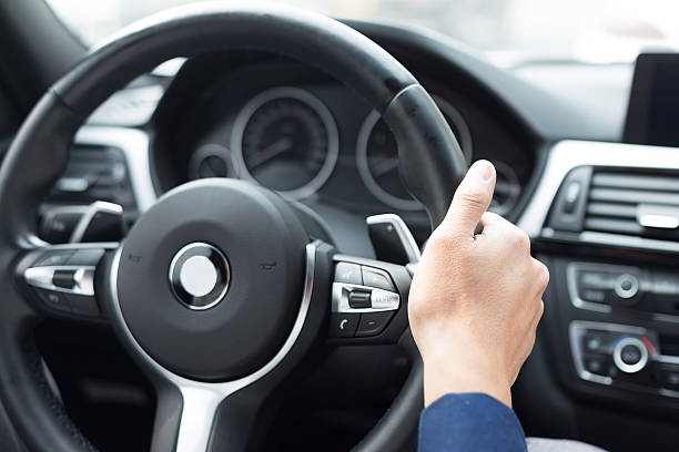 istock asian young businessman operates the car dashboard 529724897