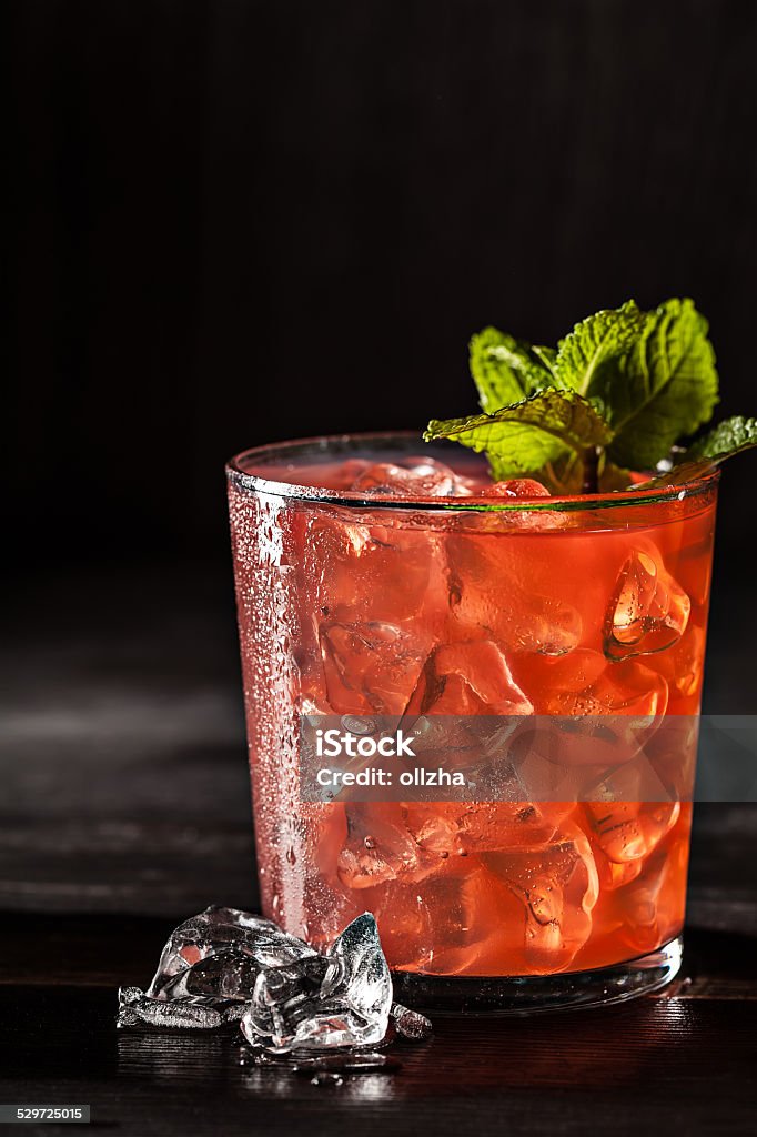 Juicy grapefruit drink on dark table Juicy cold grapefruit drink on dark table Alcohol - Drink Stock Photo