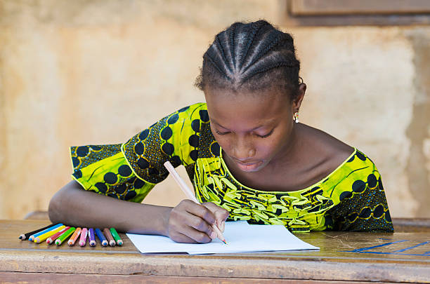 istock Black African Ethnicity Student Writing Symbol Background Concept in Mali 529726183