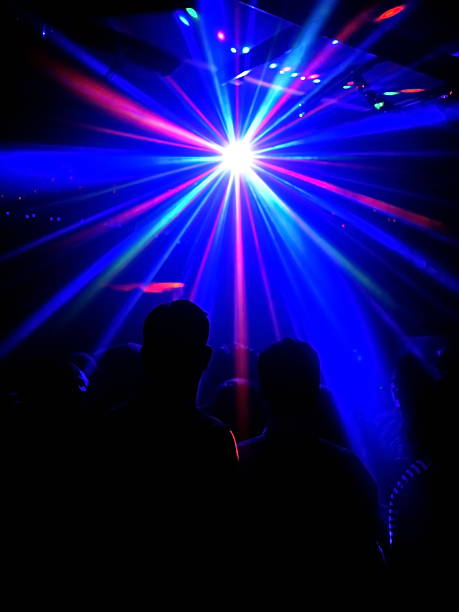 istock real disco light flare with people 529727039