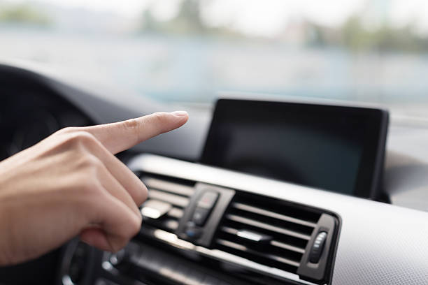istock asian young businessman operates navigator in car 529727359