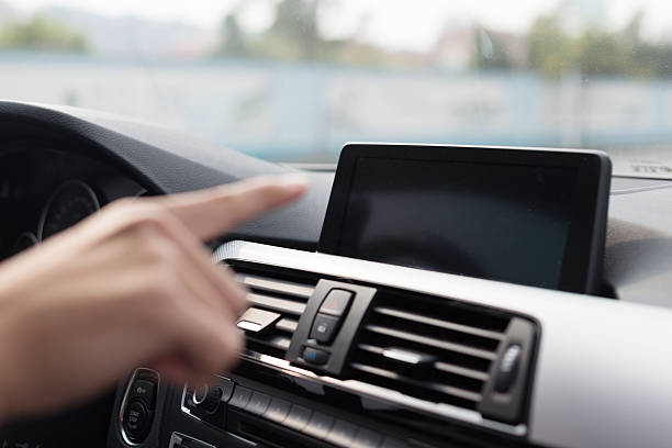 istock asian young businessman operates navigator in car 529727977