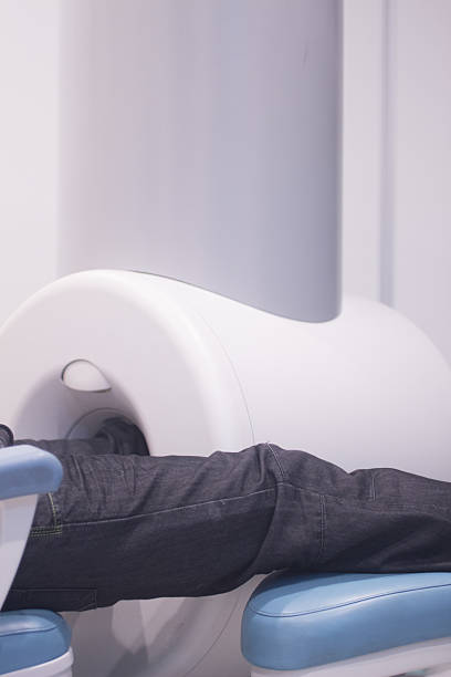 istock Patient in fully open MRI CAT Scan 529744409