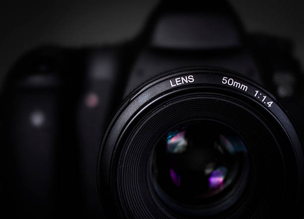 istock DSLR camera with 50mm lens. 529744815