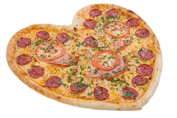 istock pizza in the shape of a heart 529745017