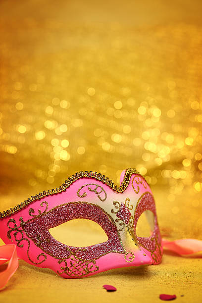istock Vintage carnival mask in golden background 529746673