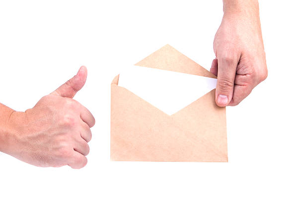 istock hands holding envelopes with letters on the white background iso 529747341