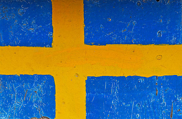 istock Flag of Sweden on concrete wall 529747401
