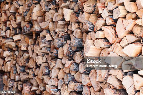 Woodpile From Dry Oak Logs Stock Photo - Download Image Now - Arranging, Autumn, Backgrounds