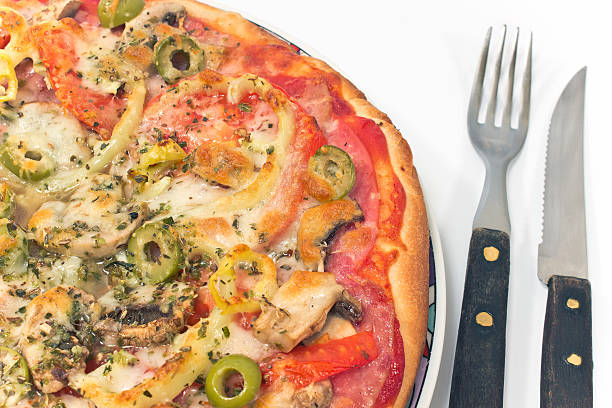 istock Delicious italian pizza with fork and knife 529767437