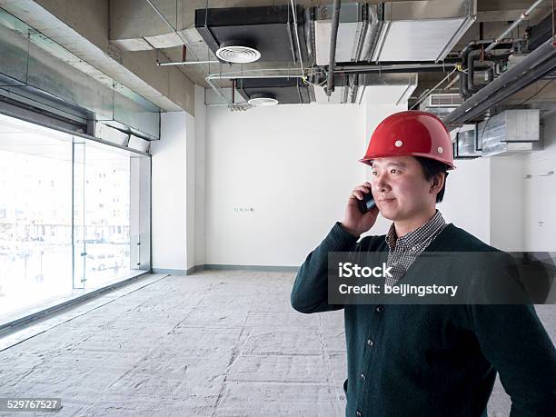 Construction Project Manager Stock Photo - Download Image Now - Adult, Adults Only, Architecture