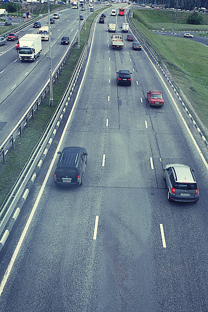 istock blurred motion background top view of road 529771043