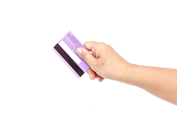 istock Hand holding credit card isolated on white background 529771753