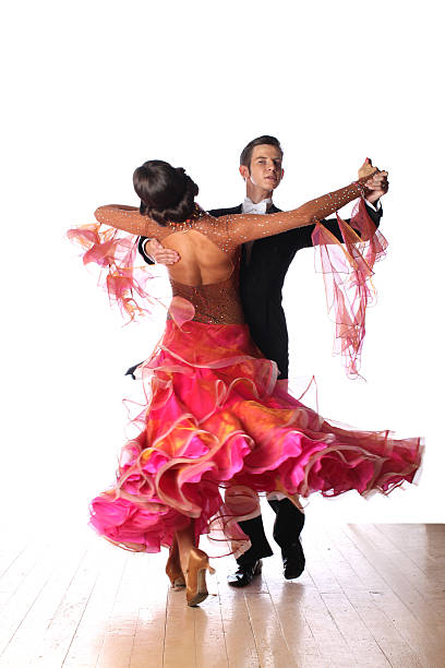 istock Latino dancers in ballroom isolated on white background 529772447