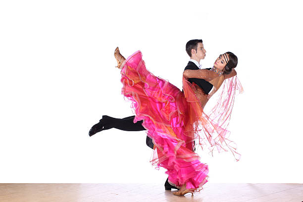 istock Latino dancers in ballroom isolated on white background 529772449